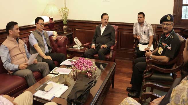Khandu and Bhamre discuss compensation and land acquisition issues for defence purposes