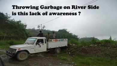 Throwing Garbage in River side,  lack of Awareness ?