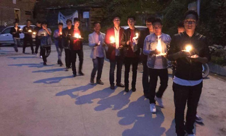 SUMAA organises Candle Light Procession for late Toko Yame