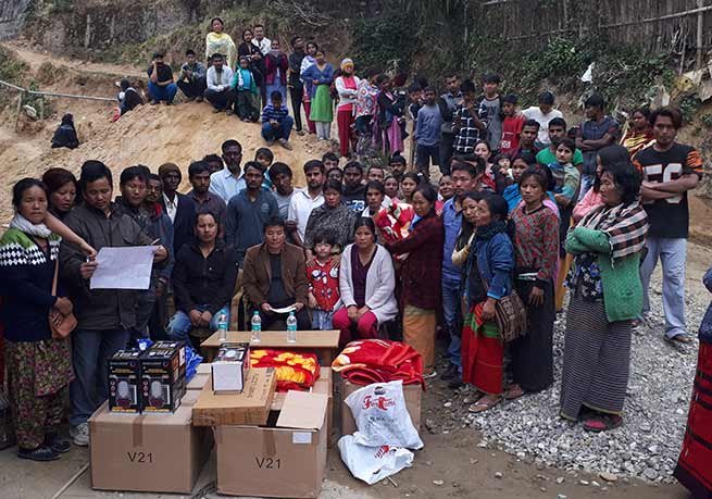 Itanagar: Jalley Sonam distributes relief materials to the fire victims
