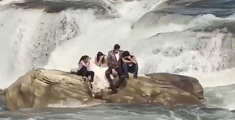 VIRAL NEWS: Couple gets stuck in waterfall during pre-wedding shoot