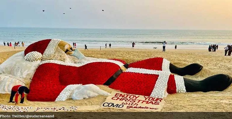 Christmas: Sand artist Sudarsan Pattnaik creates Santa' sand sculpture with 5,400 roses