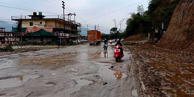 Potholes filled with water, mud in Naharlagun-Nirjuli NH-15 make for road commuters' nightmare