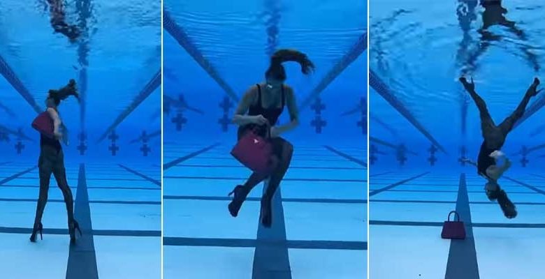 Viral Video: woman walking upside-down inside a swimming pool