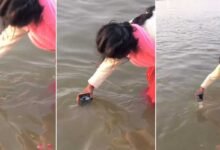 Viral video: Woman performs 'Digital snan' for husband, dunks phone into Ganga at Mahakumbh