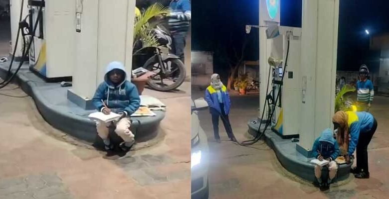 Viral photo of boy studying at petrol pump gets govt aid