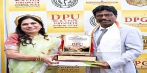 Prof Divakaran Honoured at AIU Pune Event