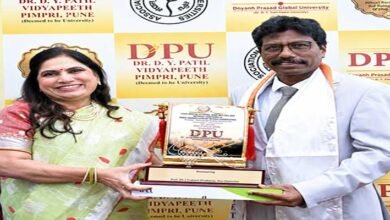 Prof Divakaran Honoured at AIU Pune Event