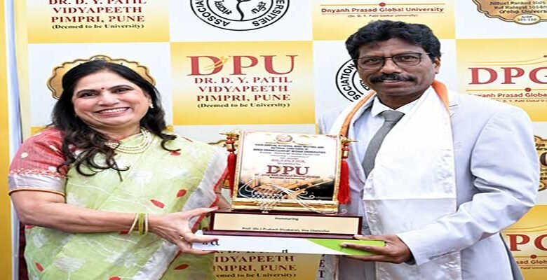 Prof Divakaran Honoured at AIU Pune Event