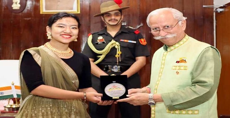Governor Felicitates Manami Gamlin with Rising Sun Medallion